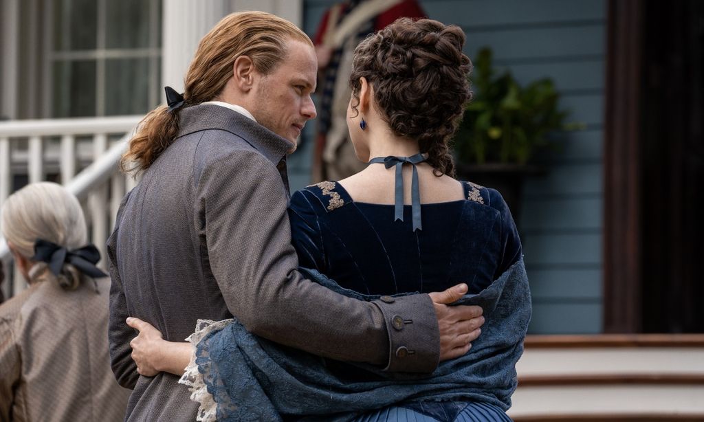 Sam and Caitriona hug in character in Outlander