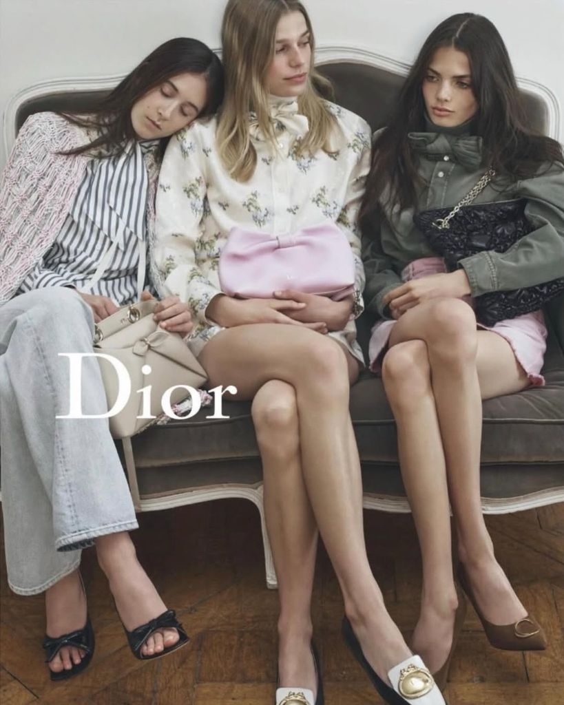 Sunday Rose in a new Dior campaign wearing stripe shirt and jeans