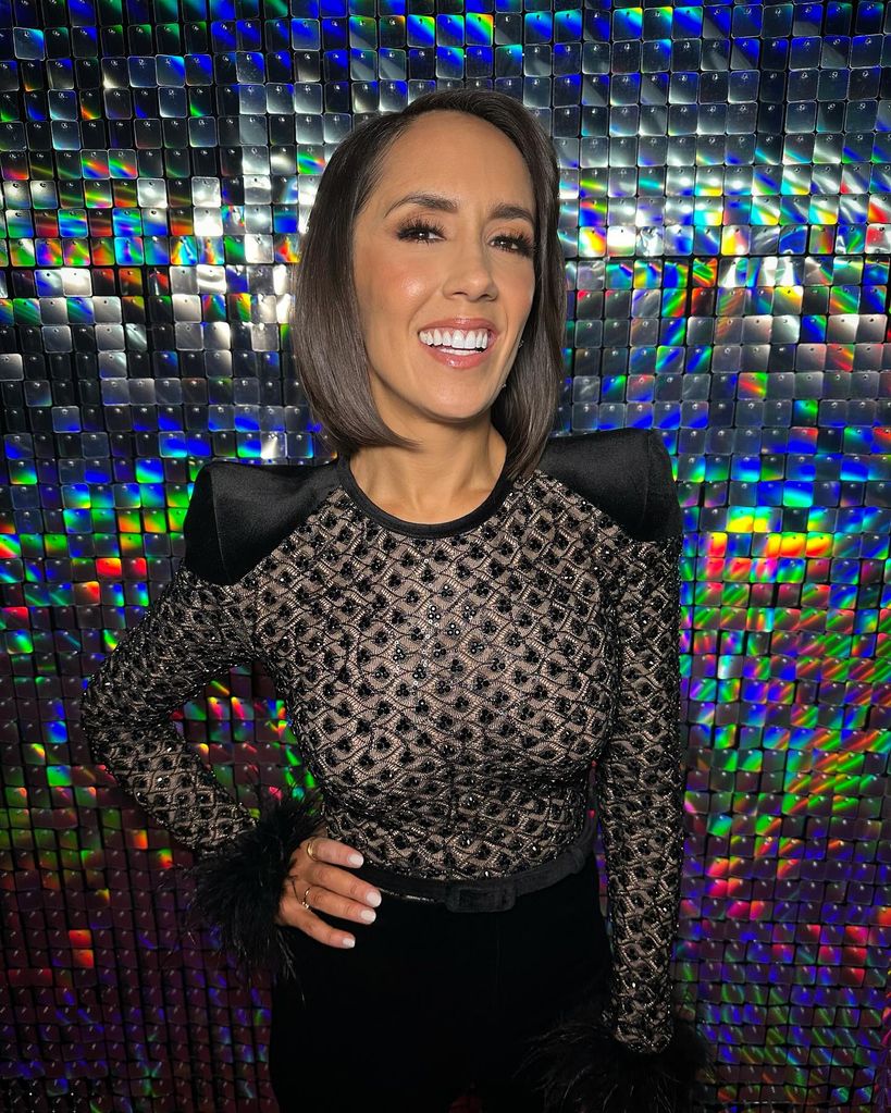 Janette Manrara posing in black top backstage at Strictly Come Dancing Live tour 