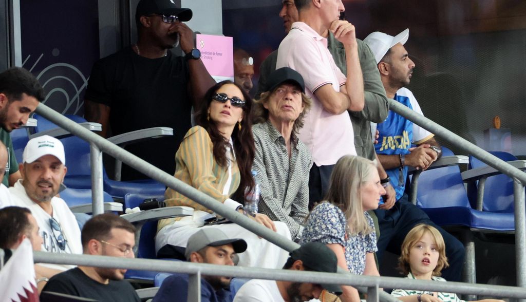 Mick and Melanie's son Deveraux was sat in the row in front