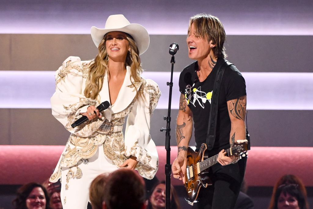 Lainey and Keith performing at The 59th Annual CMA Awards 