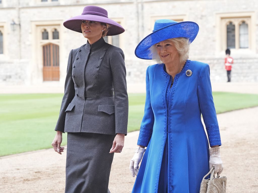 US First Lady Melania Trump and Queen Camilla walking together and smiling