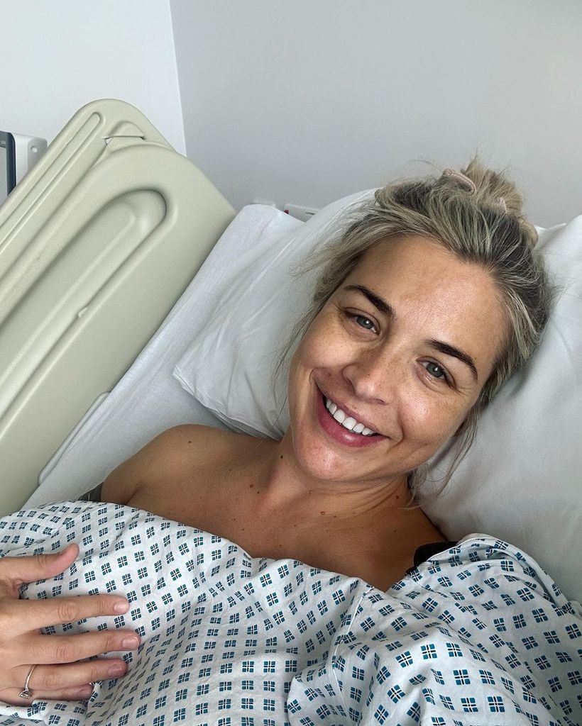 Gemma Atkinson smiling in a hospital bed
