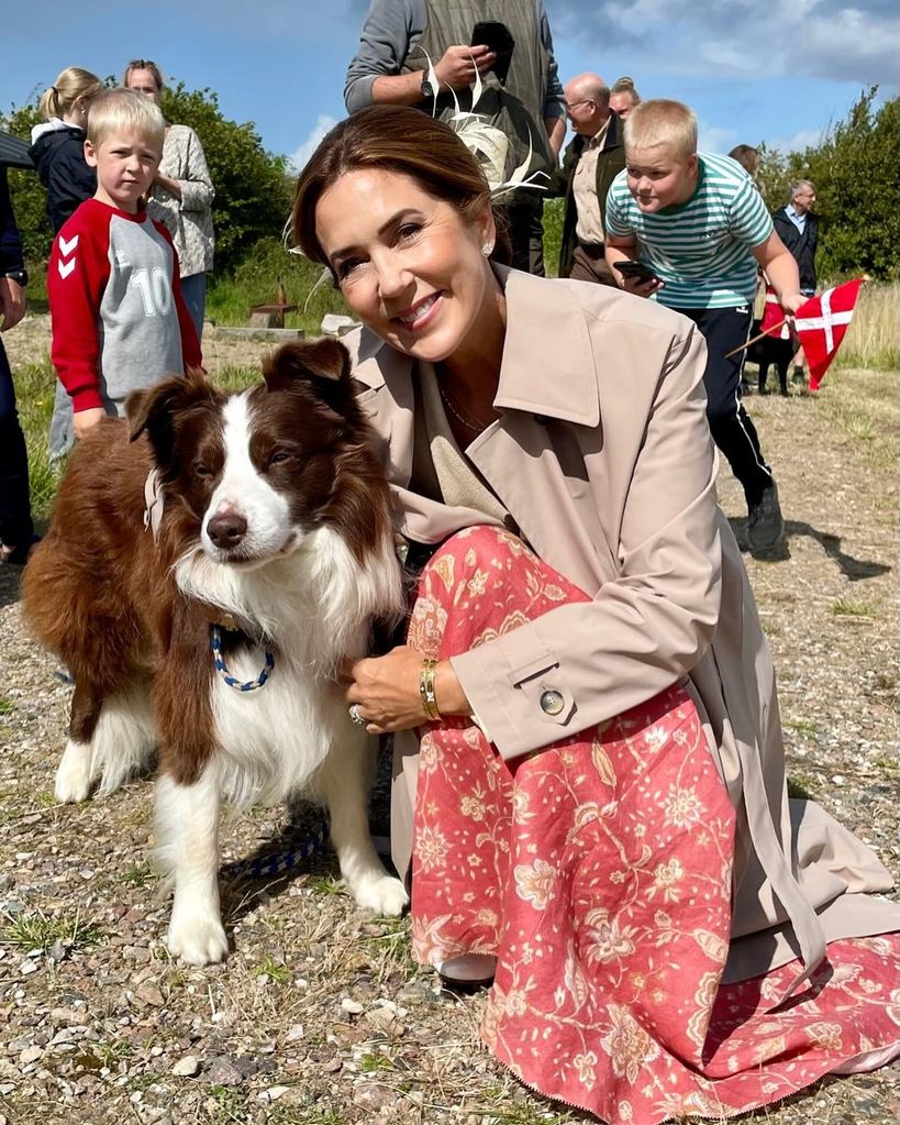 Queen Mary and dog on royal tour