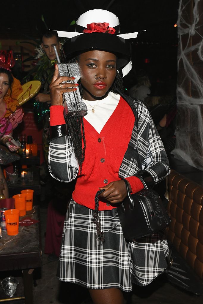 Lupita Nyong'o dressed as Dionne from Clueless