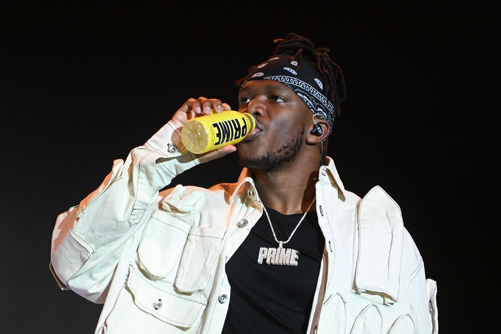 KSI drinking from a Prime bottle