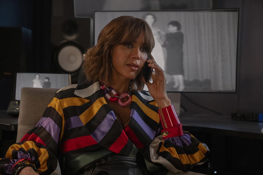 Lisa's colourful rainbow striped jacket on And Just Like That...
