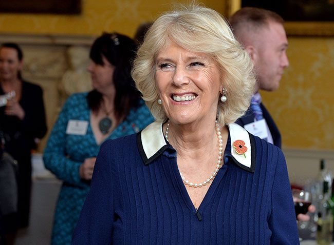 The Duchess of Cornwall sees the funny side as she is handed a parking ...