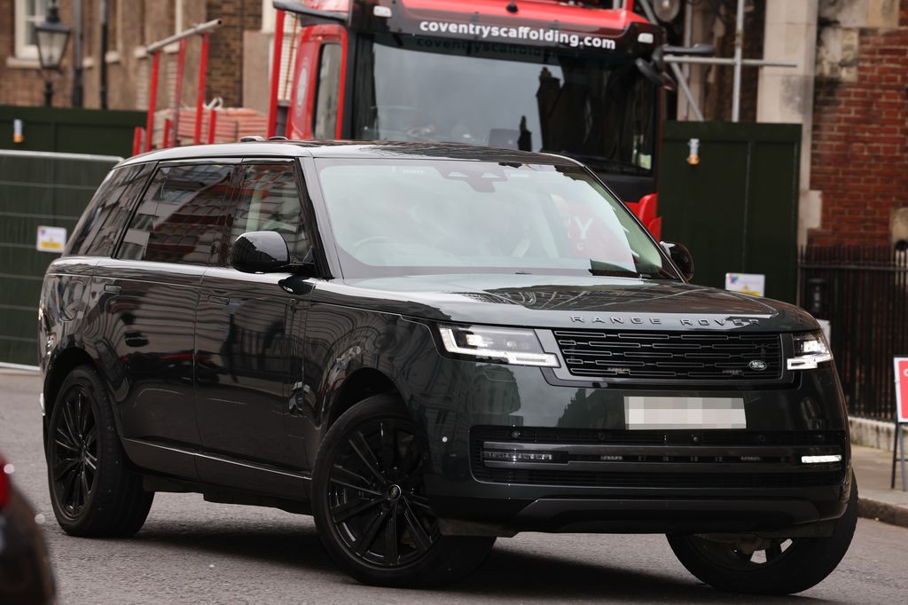 A Range Rover believed to have Andrew Mountbatten-Windsor in the back arrives at the christening