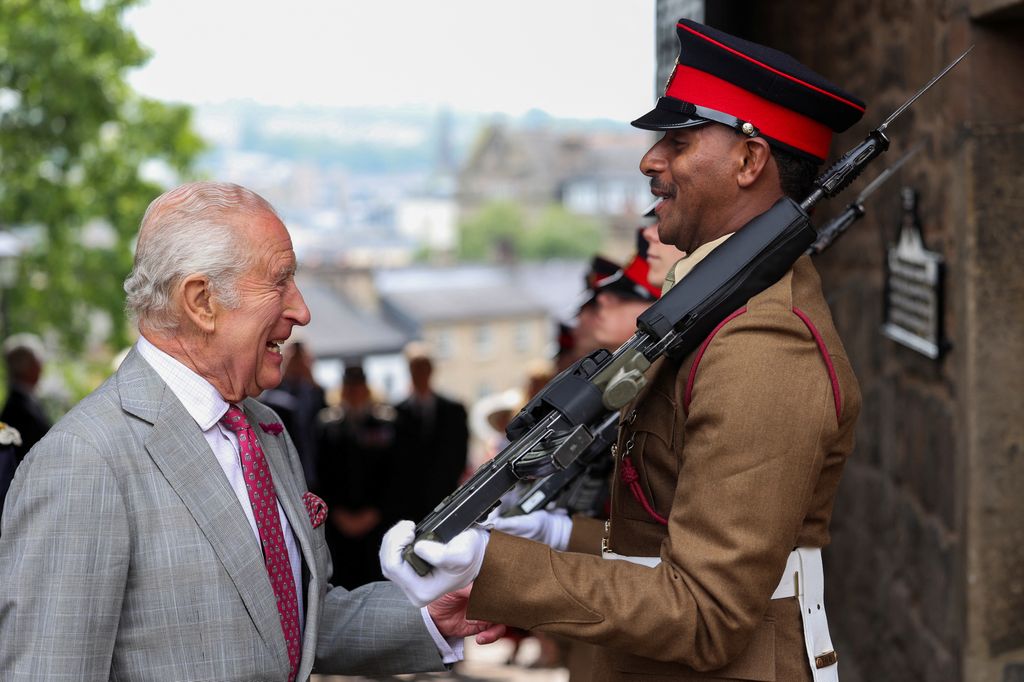 King Charles III, The Duke of Lancaster, inspects the honor guard during the Ceremony of the Keys at Lancaster Castle