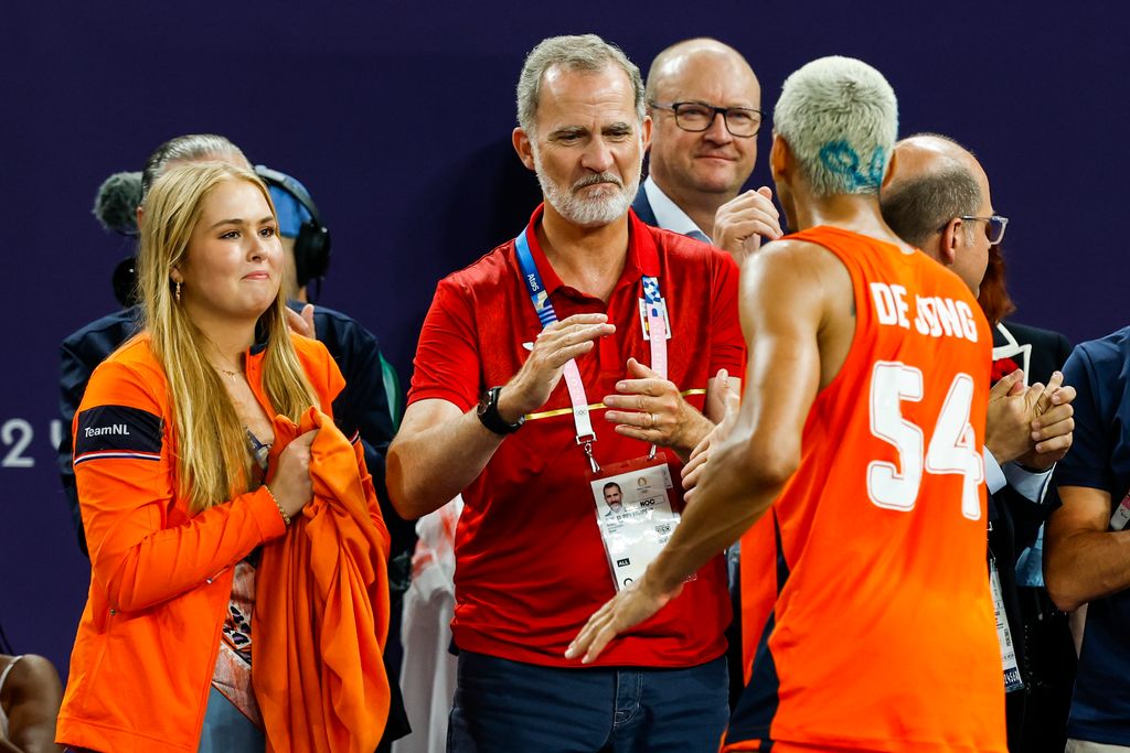 Princess Catharina Amalia and King Felipe congratulate Worthy de Jong of Netherlands