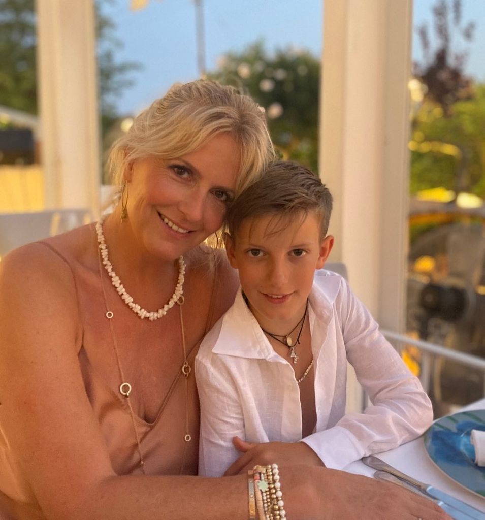 Penny Lancaster cuddled up with son Aiden