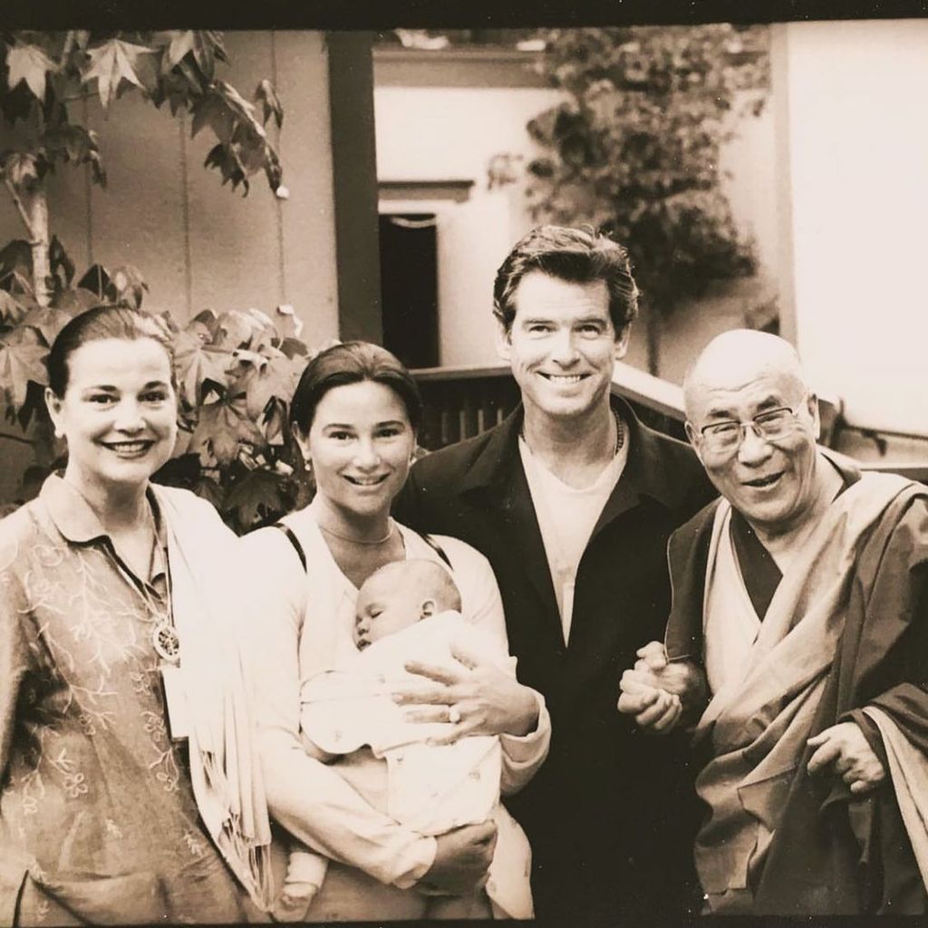 Pierce Brosnan and Keely Shaye with the Dalai Lama and their young son