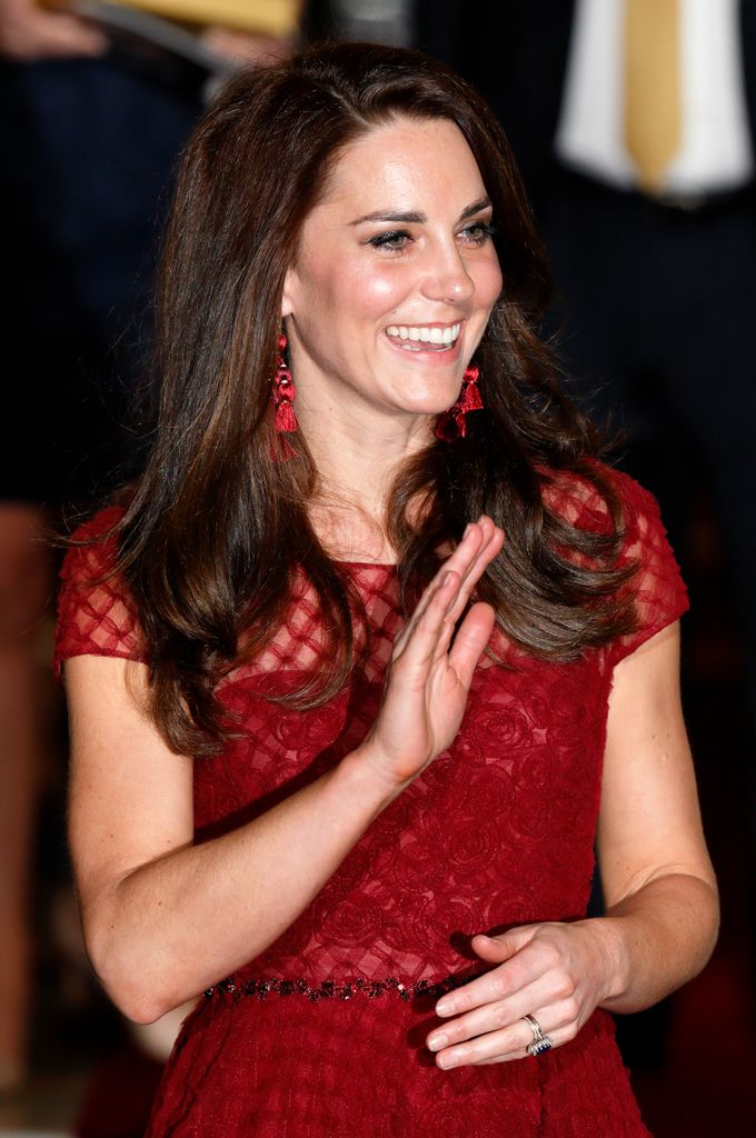 Kate waving waist up in red dress