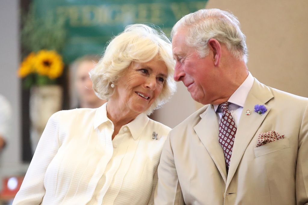 King Charles and Camilla looking at each other