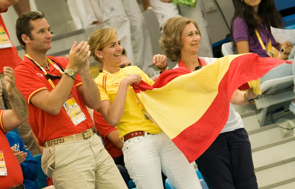 Queen Sofia of Spain, Infanta Cristina of Spain and her husband Inaki Urdangarin attend the synchronised swimming competition during the Beijing 2008 Olympic Games