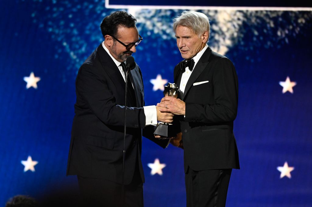 James Mangold and Harrison Ford accepts the Career Achievement Award at The 29th Critics' Choice Awards held at The Barker Hangar on January 14, 2024 in Santa Monica, California.