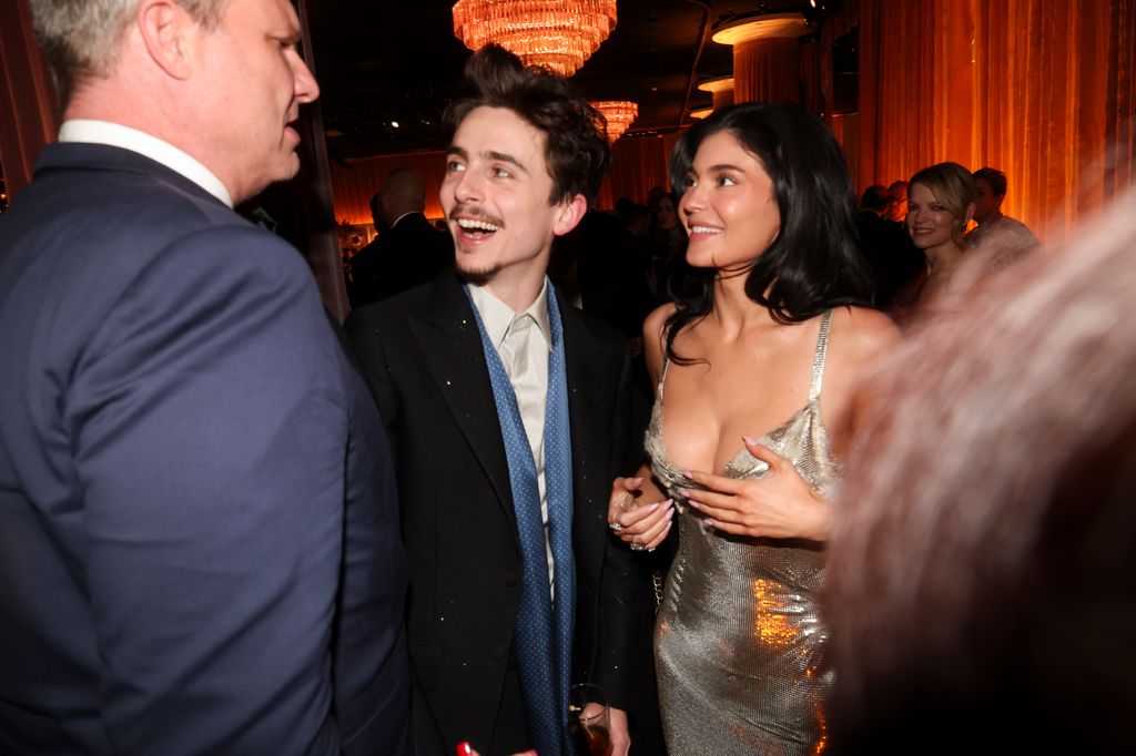 Kylie Jenner and Timothée Chalamet chatting during the 82nd Annual Golden Globes