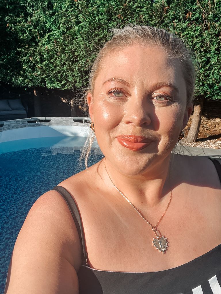 Woman taking a selfie in a paddling pool