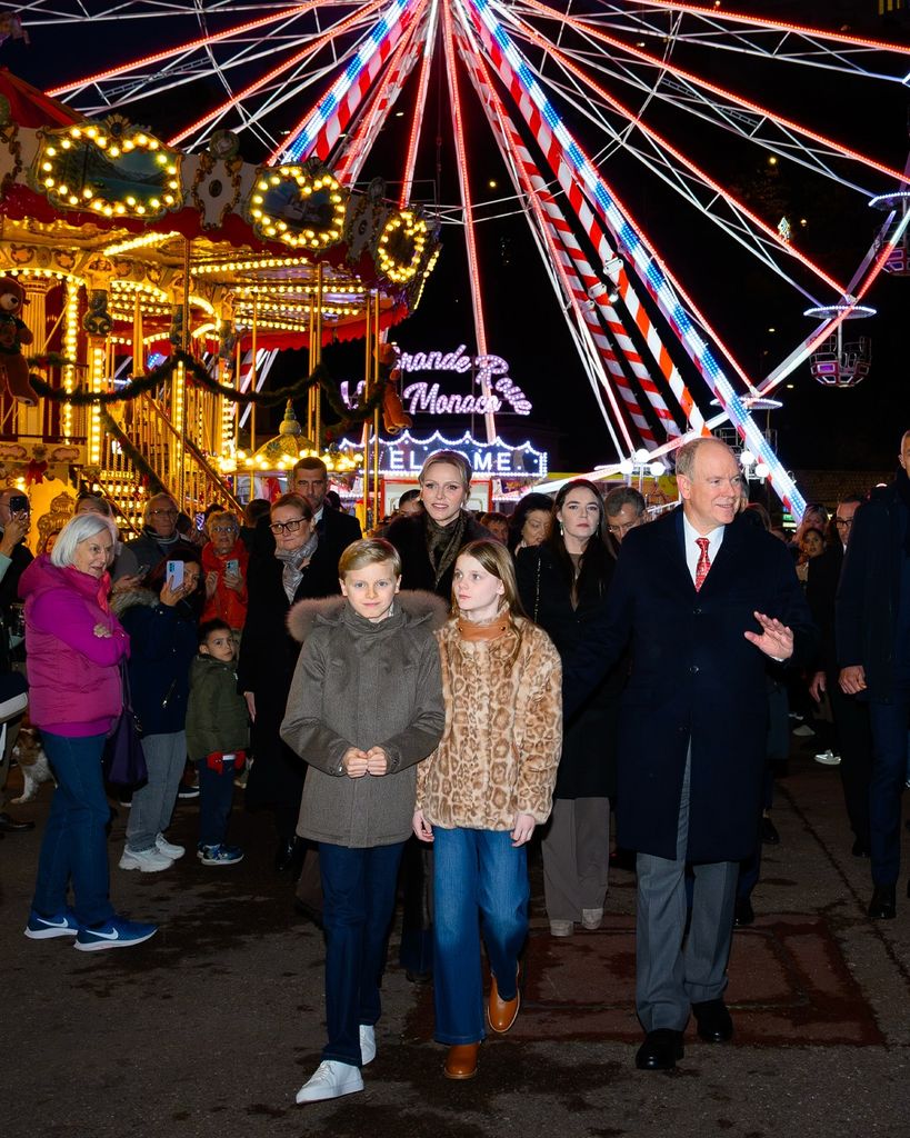monaco royal family in coats at christmas fair