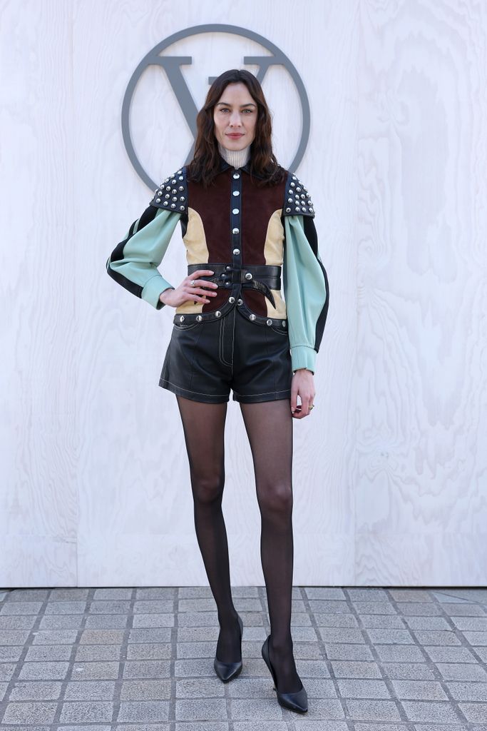 Alexa Chung wears Louis Vuitton leather shorts during Paris Fashion Week