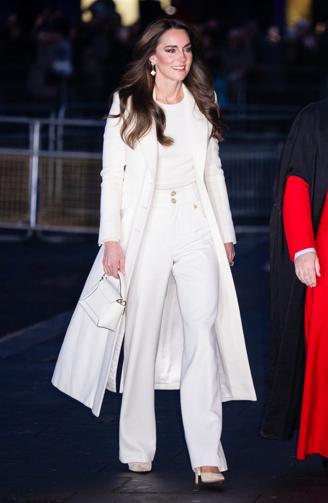 Catherine, Princess of Wales attends The "Together At Christmas" Carol Service at Westminster Abbey in all white look