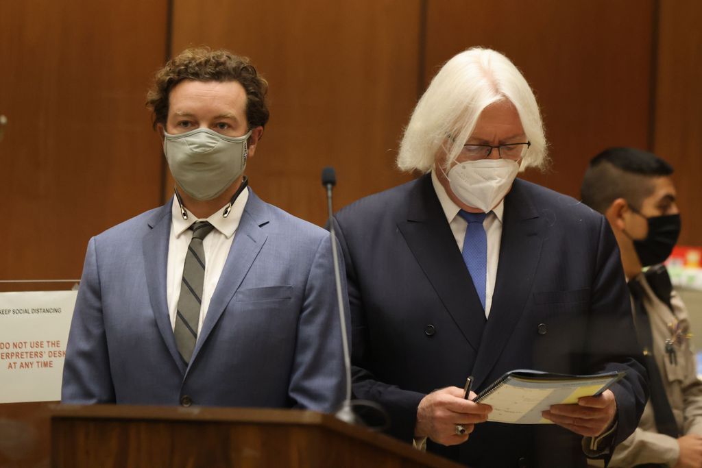 Actor Danny Masterson stands with his lawyer Thomas Meserea