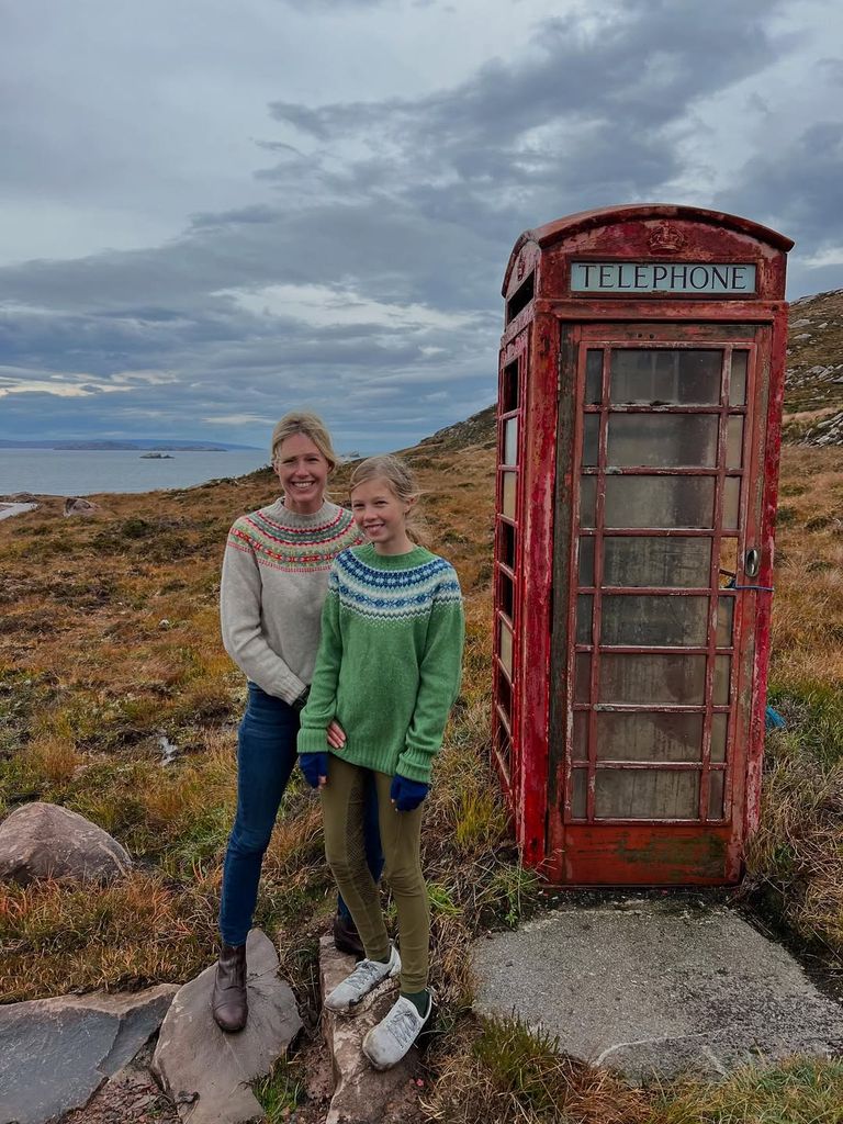 Ben Fogle's wife and daughter in fair isle jumpers next to the sea