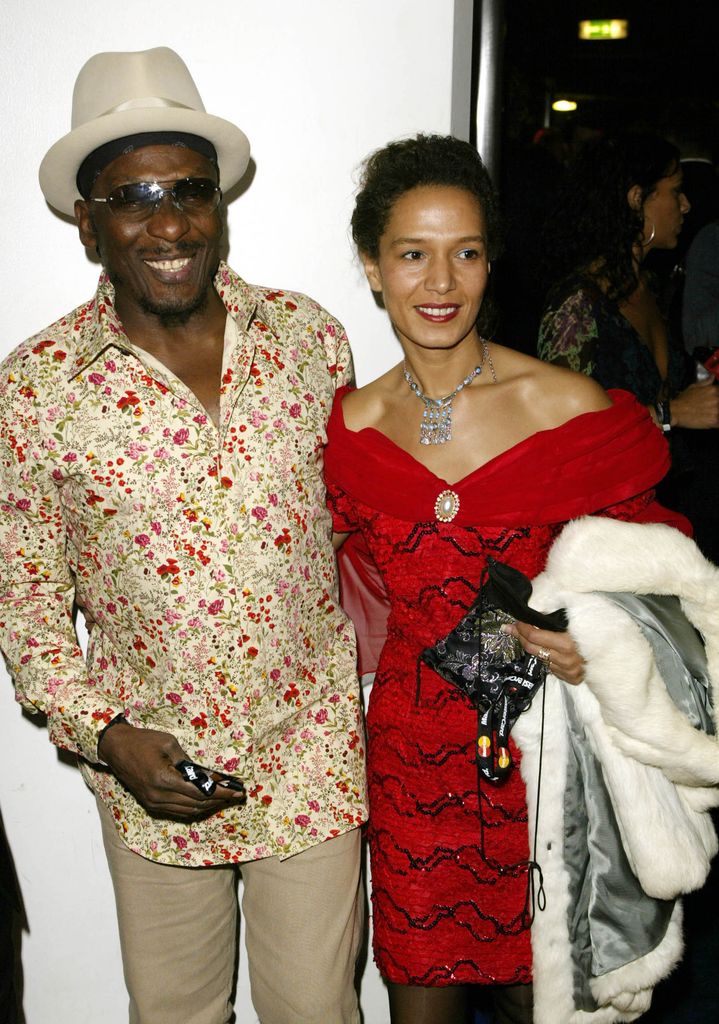 Jamacian singer Jimmy Cliff with his wife attend the MOBO Awards at London Arena on October 1, 2002 in London.