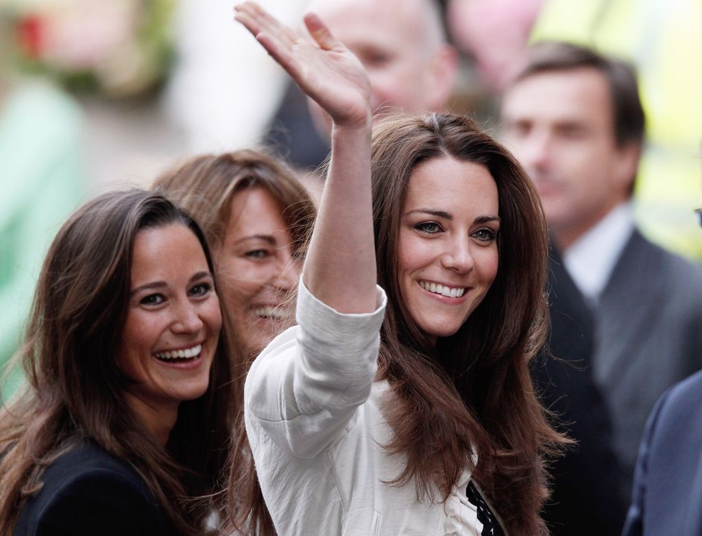 Princess Kate waving with her mother Carole and sister Pippa