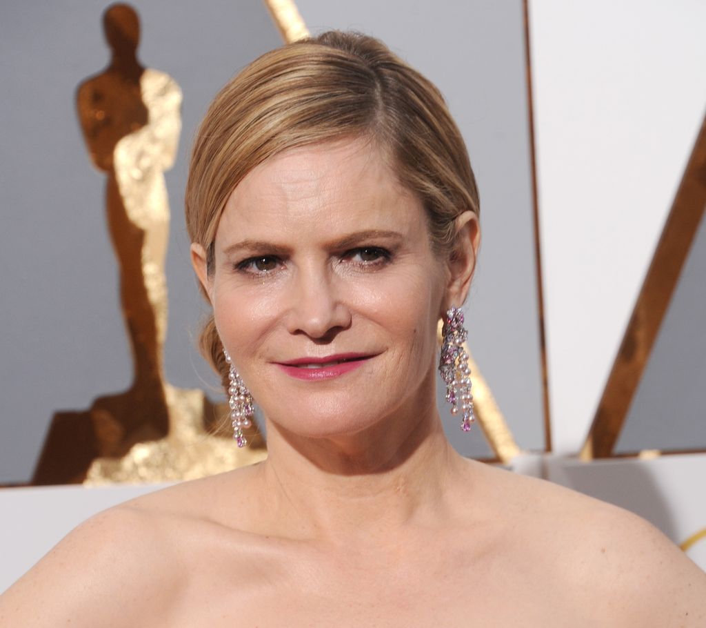 Jennifer long earrings, and strapless gown 