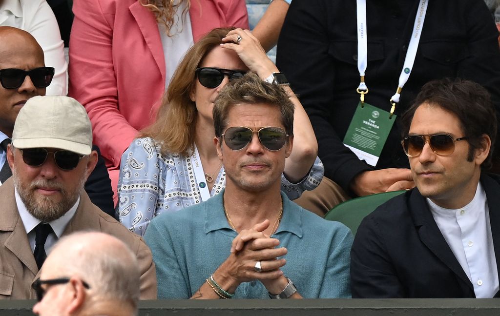 Brad Pitt watches the men's singles final tennis match between Spain's Carlos Alcaraz and Serbia's Novak Djokovic at the 2023 Wimbledon Championships in Wimbledon, southwest London, on July 16, 2023