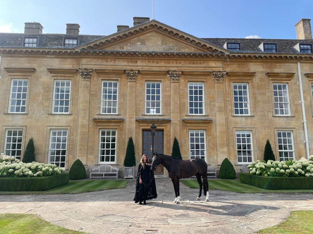 Jemima and her 'little rocket' Oreo pose outside Cornbury House