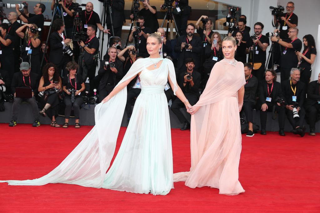 Lady Eliza Spencer and Lady Amelia Spencer walking down the red carpet at the Venice International Film Festival