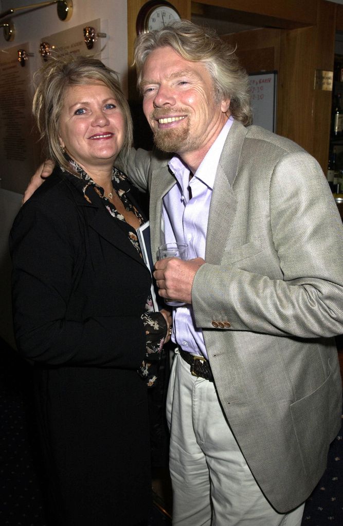 Sir Richard Branson and wife Joan with their arms around each other 