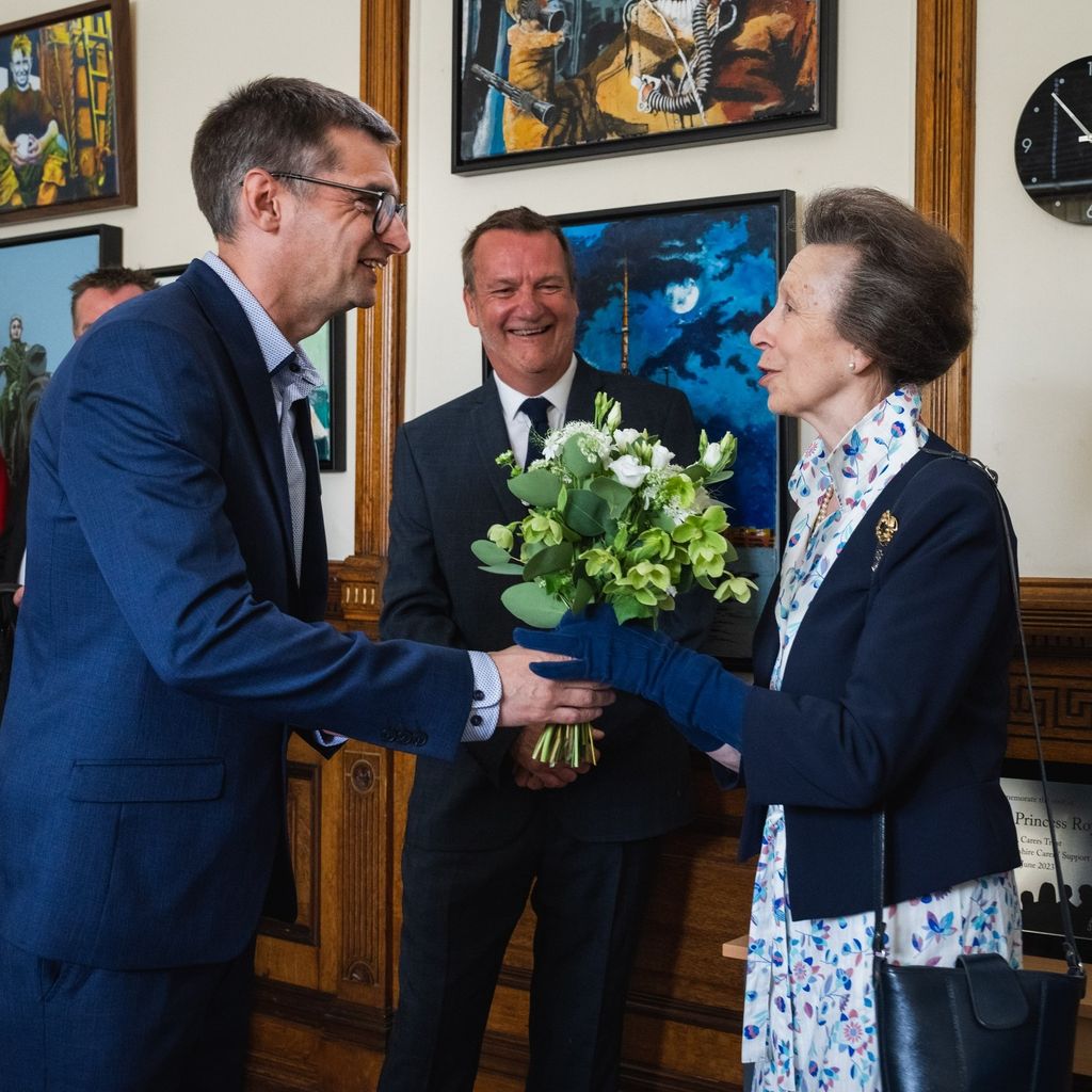 Princess Anne recieves a bouquet of flowers