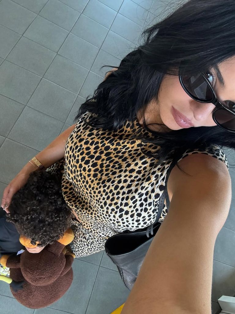 kylie jenner selfie in leopard print outfit