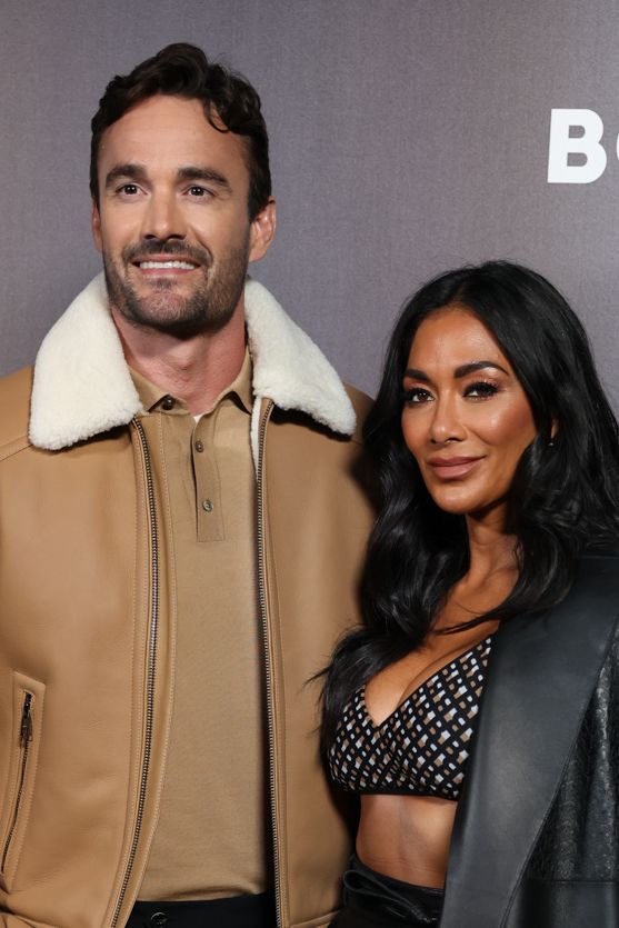 Thom Evans and Nicole Scherzinger are seen arriving at the Boss Fashion Show during the Milan Fashion Week Womenswear Spring/Summer 2023 on September 22, 2022 in Milan, Italy