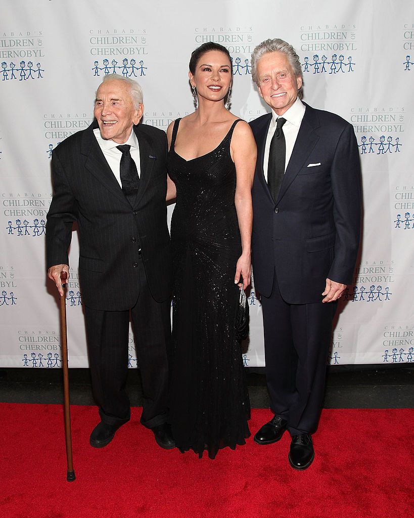 Catherine Zeta-Jones with her husband Michael and father-in-law Kirk in 2011