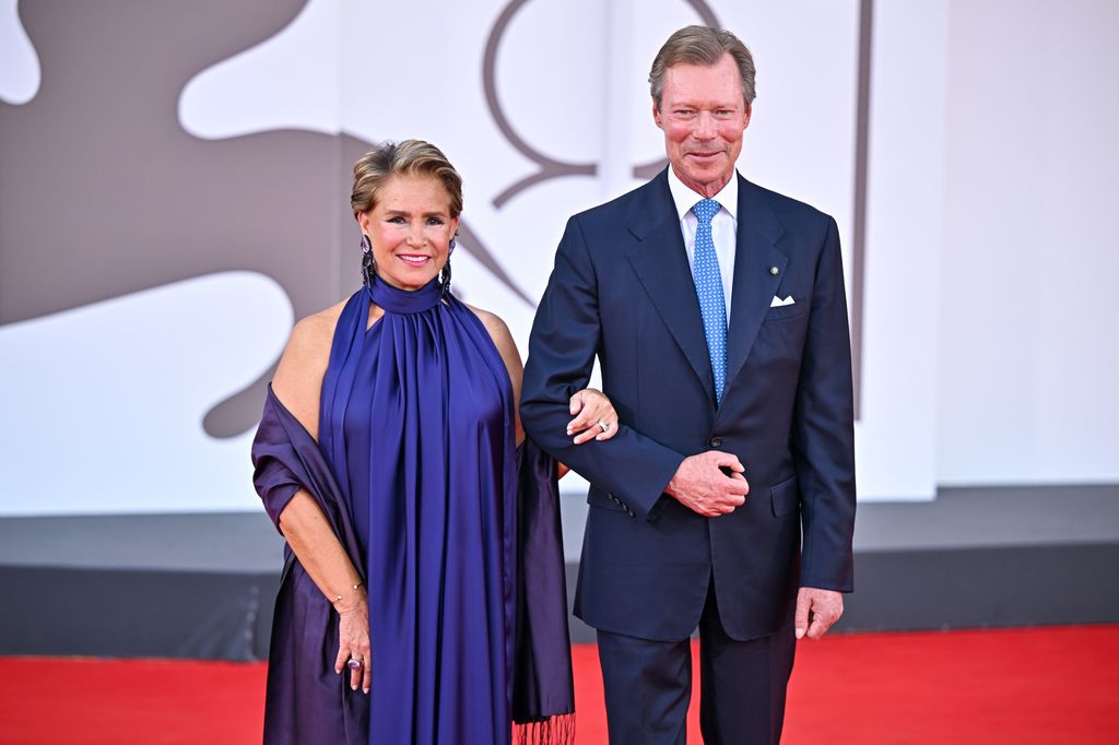 couple posing on red carpet