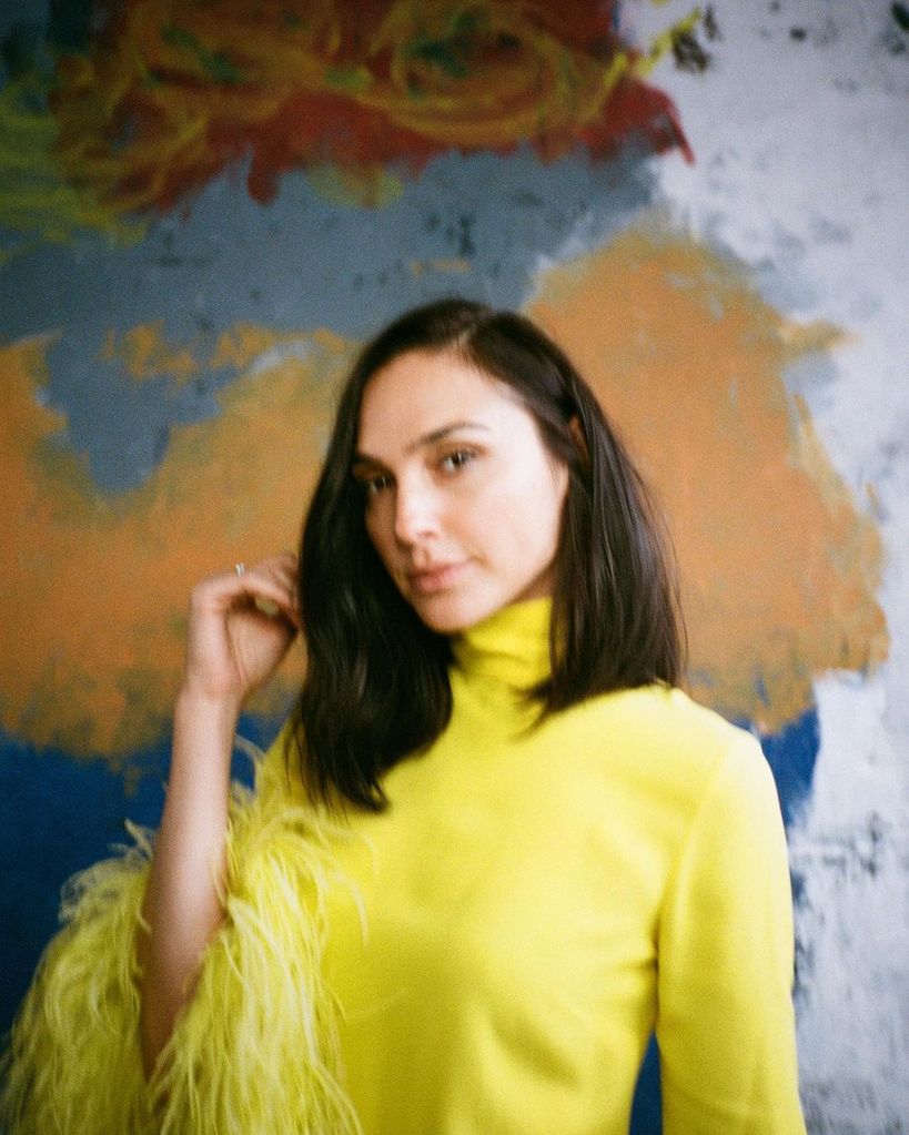 Gal Gadot looks incredible in a yellow feathered dress | HELLO!