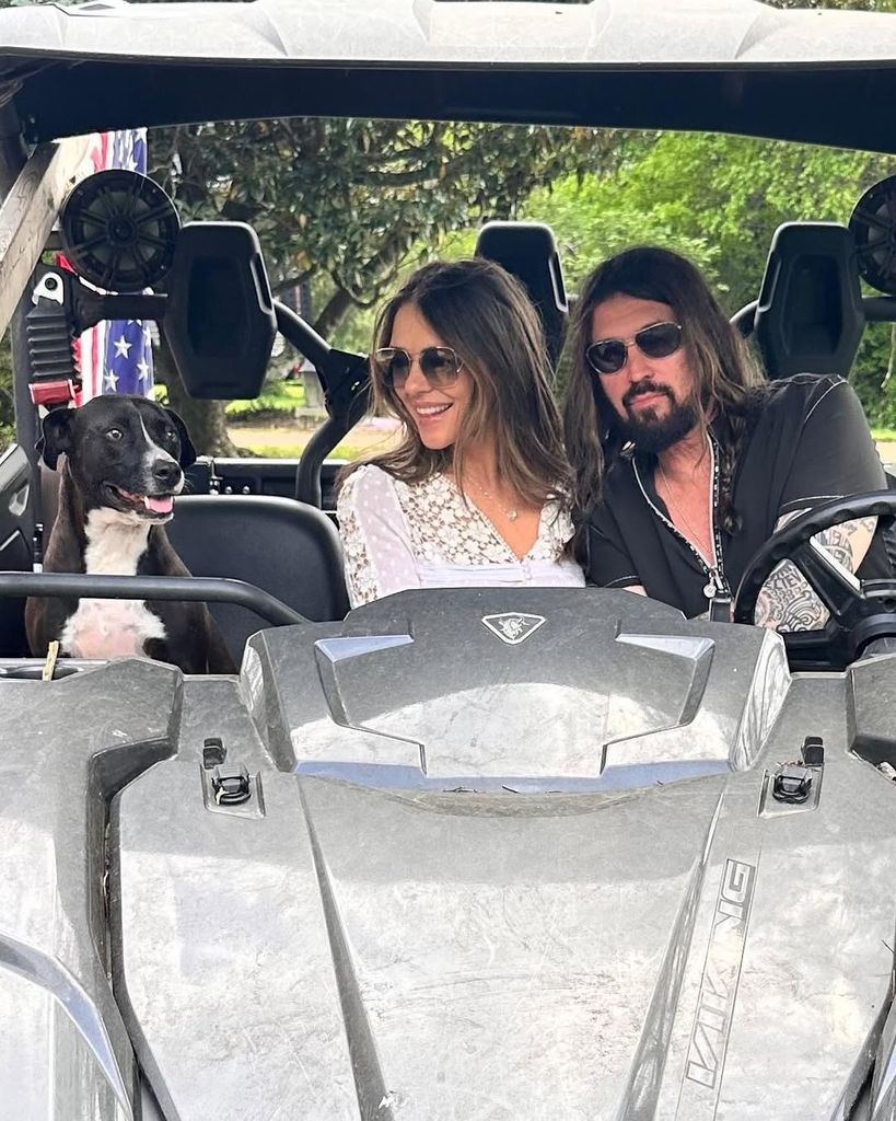 Liz Hurley Billy Ray Cyrus in a truck