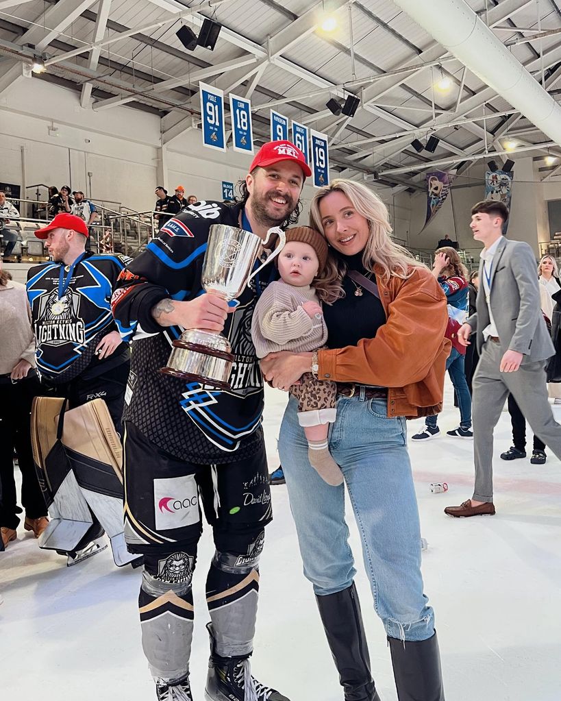 Liam with his wife Nicole and son Louis on ice