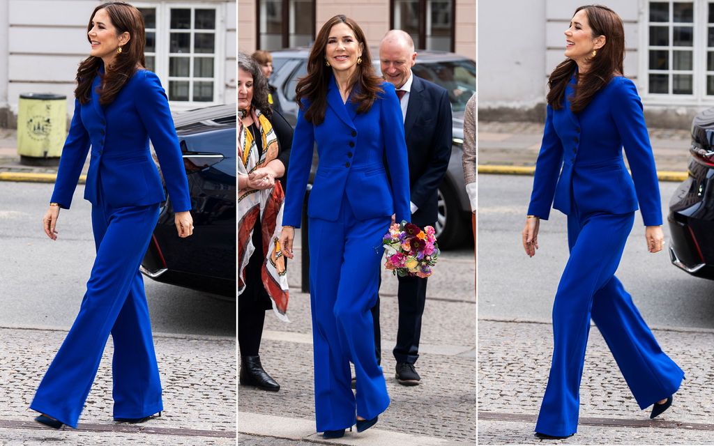 Queen Mary wearing cobalt blue trouser suit