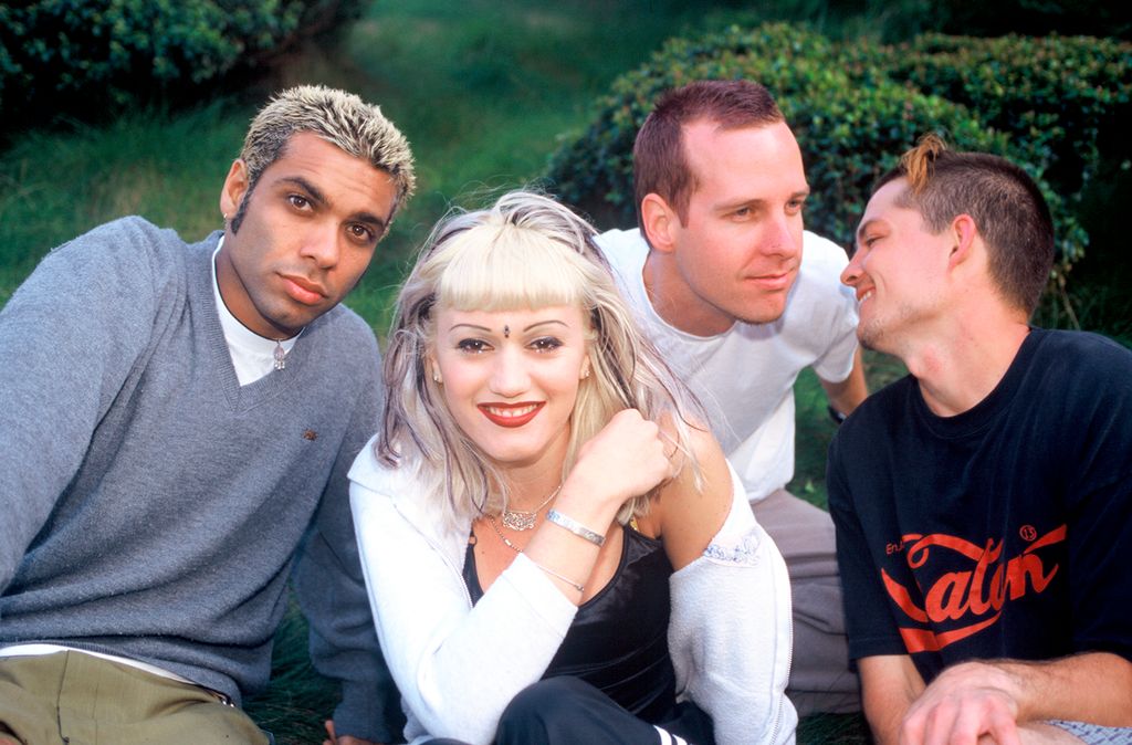 No Doubt band members (L-R) bassist Tony Kanal, singer Gwen Stefani, Tom Dumont and Adrian Young backstage in 1996