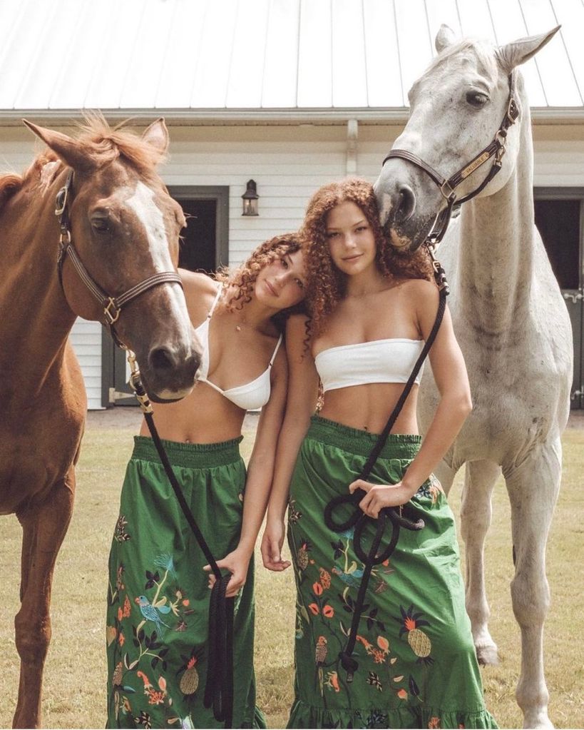 Isabella and Sophia Strahan posing with their horses on their mother Jean Muggli's farm, shared on Instagram