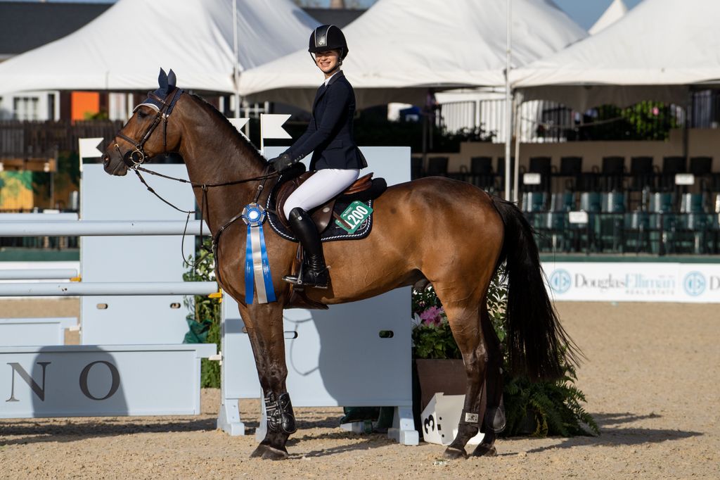  Jennifer Gates comes in first place during the $15,000 High A/O 1.45M Jumper Classic 