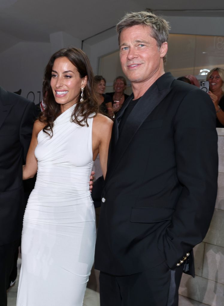 Ines de Ramon and Brad Pitt attend the 81st Venice International Film Festival 