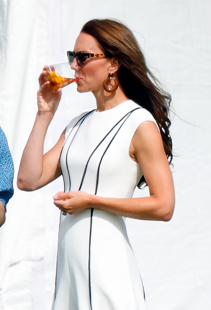 Catherine, Duchess of Cambridge attends the Out-Sourcing Inc. Royal Charity Polo Cup at Guards Polo Club, Flemish Farm o