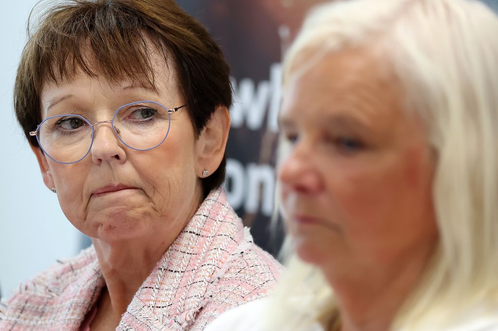 Two women holding a press conference
